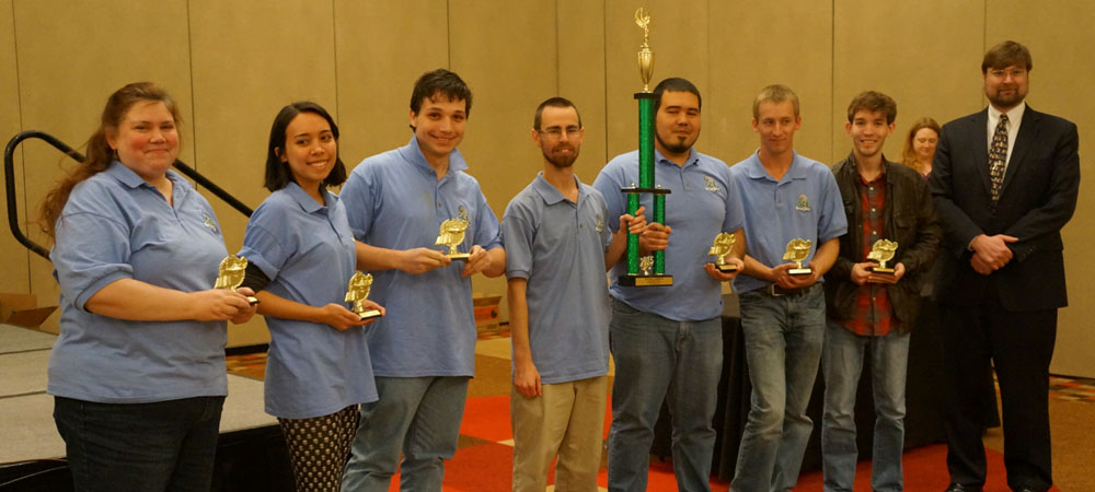 State College of Florida-Manatee with their first-place trophy from the 2015 Community College Championship Tournament