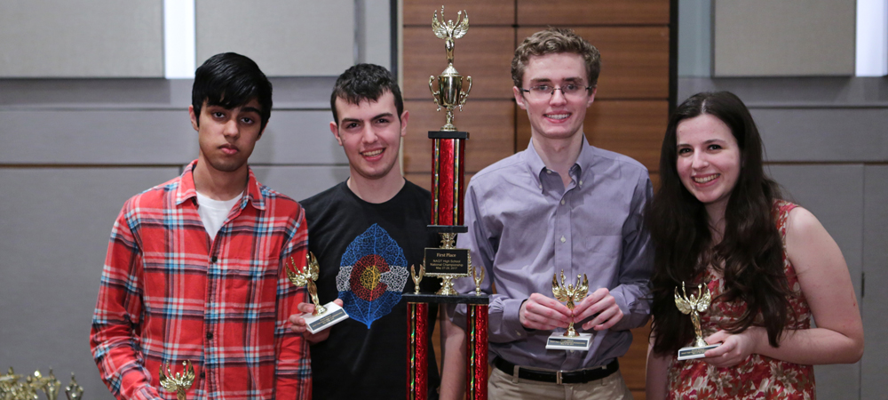 Hunter A with their first-place trophy from the 2017 High School National Championship Tournament