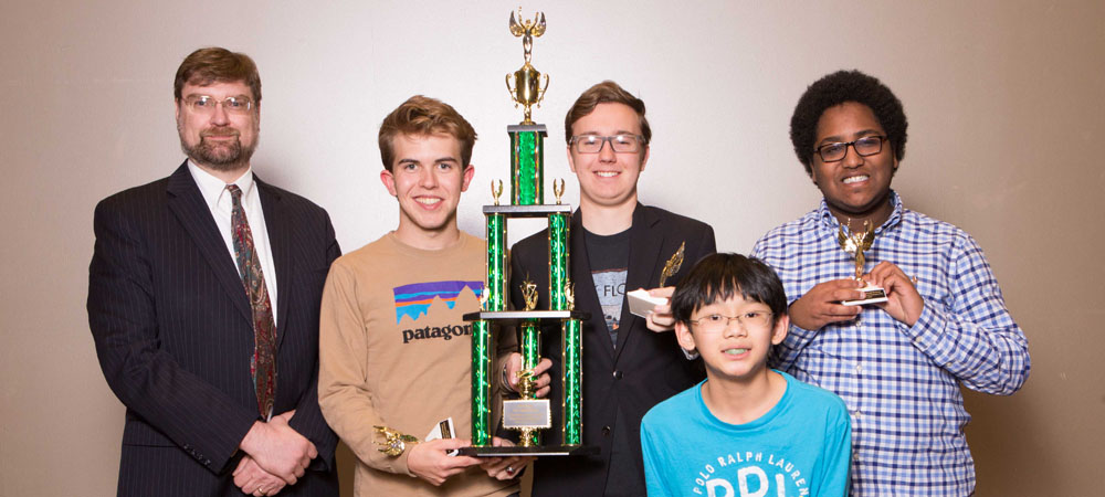 Ottawa Hills A (Toledo, Ohio) with their First-Place Very Small School trophy from the 2018 Small School National Championship Tournament