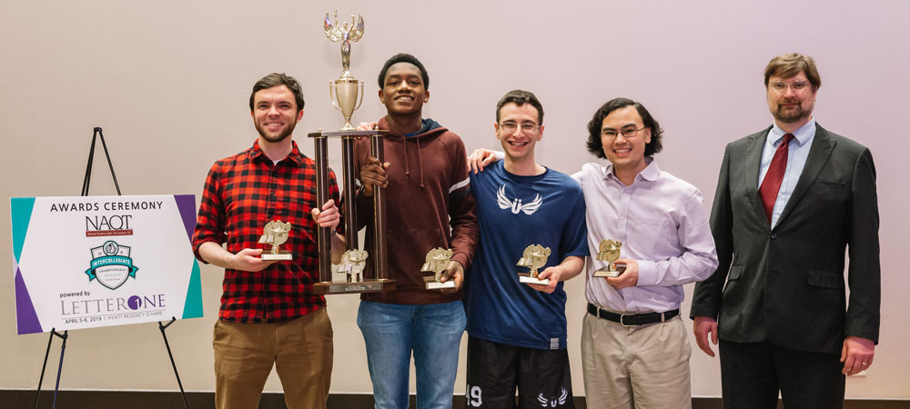 Yale&nbsp;A with their First-Place Division&nbsp;I trophy from the 2019 Intercollegiate Championship Tournament, powered by LetterOne