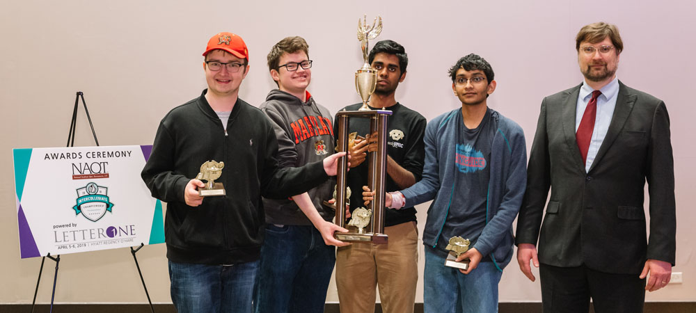 Maryland&nbsp;B with their First-Place Division&nbsp;II trophy from the 2019 Intercollegiate Championship Tournament, powered by LetterOne