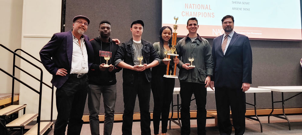 Valencia College's A team with their first-place trophy from the 2020 Community College Championship Tournament