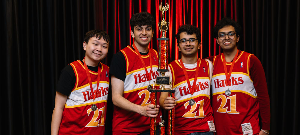 Barrington High School's A team with their first-place trophy from the 2024 High School National Championship Tournament