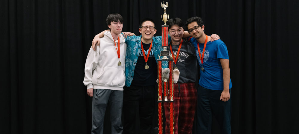 Livingston High School's A team with their first-place trophy from the 2025 High School National Championship Tournament