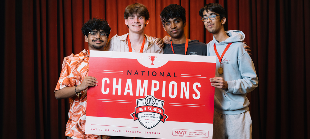 Adlai E. Stevenson High School's A team with their first-place trophy from the 2026 High School National Championship Tournament