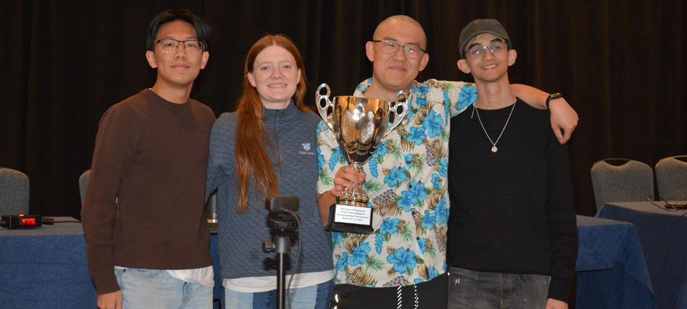 Columbia’s C&nbsp;team with their First-Place Division&nbsp;II trophy from the 2026 Intercollegiate Championship Tournament